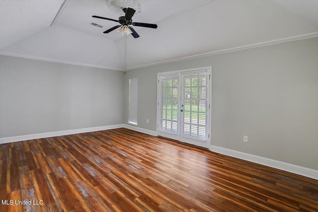 empty room with ornamental molding, vaulted ceiling, wood-type flooring, and ceiling fan