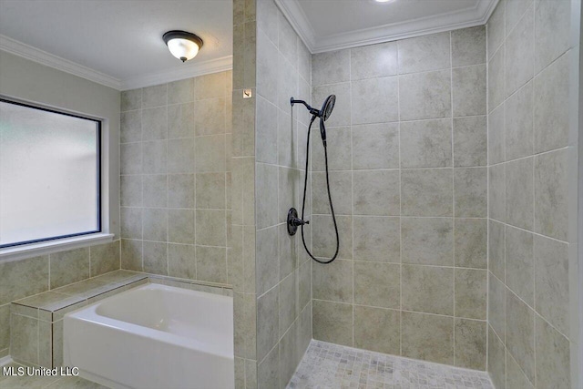 bathroom featuring ornamental molding and shower with separate bathtub