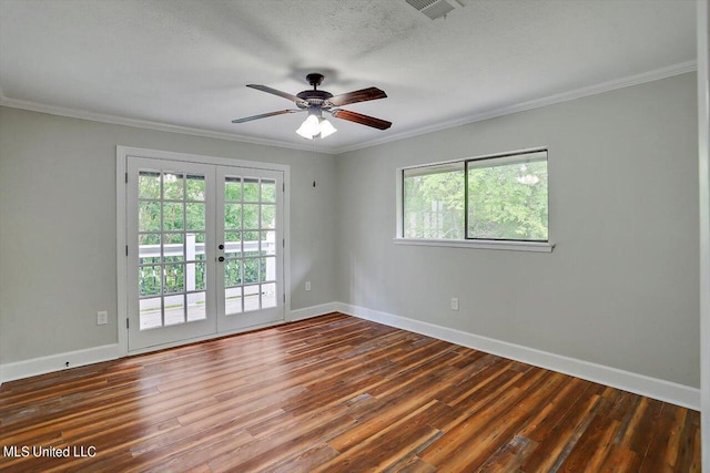 empty room with french doors, ceiling fan, dark hardwood / wood-style flooring, and a wealth of natural light