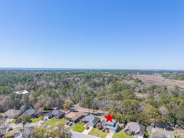 bird's eye view with a residential view and a view of trees