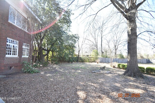 view of yard with fence