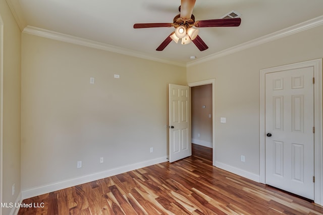 104 Faith Way, Brandon, MS 39042 - unfurnished bedroom featuring crown molding, baseboards, wood finished floors, and ceiling fan