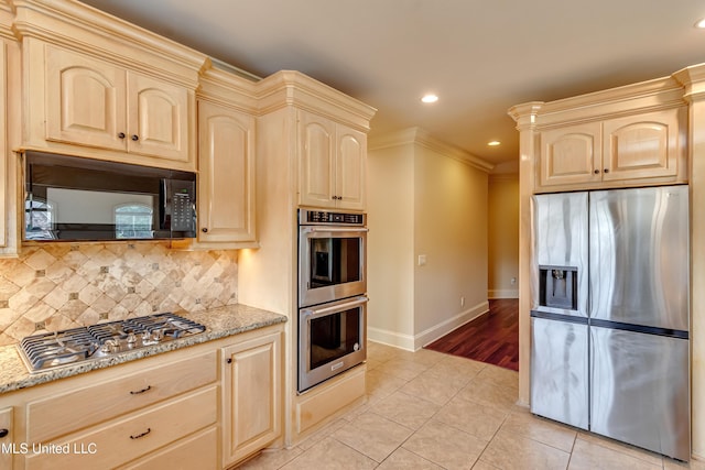 104 Faith Way, Brandon, MS 39042 - kitchen with stainless steel appliances, light stone counters, baseboards, light tile patterned floors, and recessed lighting