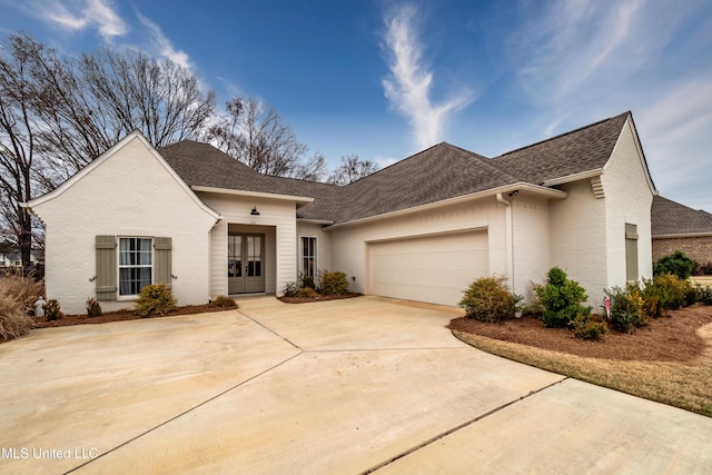 ranch-style home with a garage