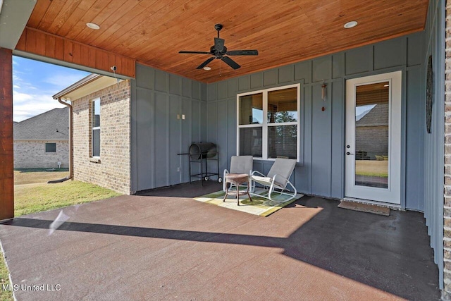 view of patio / terrace featuring ceiling fan