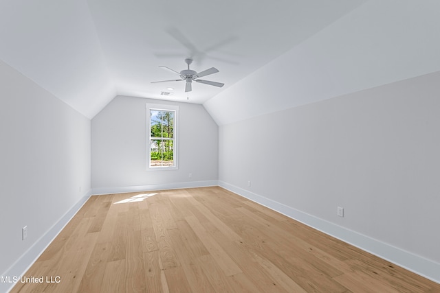 bonus room featuring lofted ceiling, light wood-type flooring, and ceiling fan