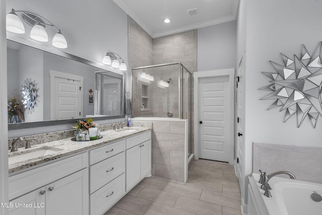 bathroom with vanity, crown molding, tile patterned floors, and plus walk in shower