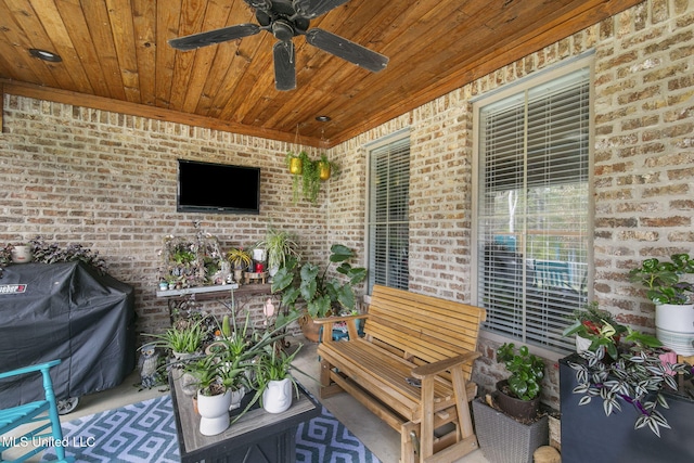 view of patio featuring grilling area and ceiling fan