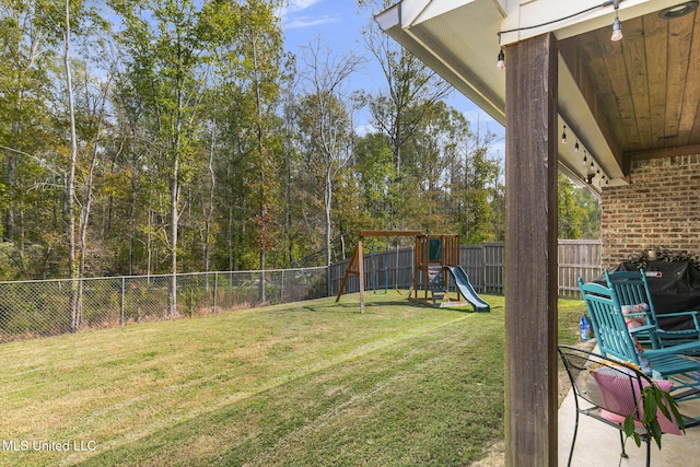 view of yard featuring a playground