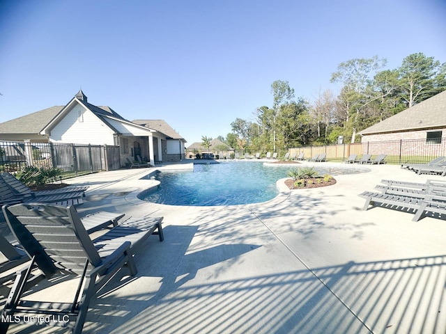 view of swimming pool featuring a patio