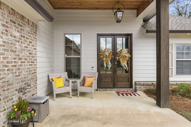 doorway to property featuring french doors and a patio area