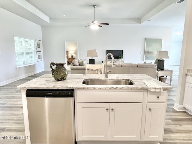 15681 Perdido Dr, Gulfport, MS 39503 - kitchen with dishwasher, a sink, open floor plan, and light wood-style flooring