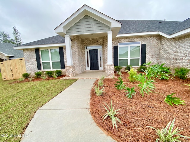 view of front facade with a front yard