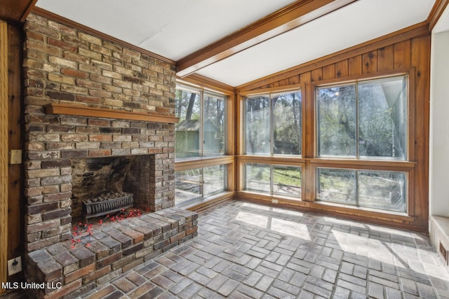 5360 Wayneland Dr, Jackson, MS 39211 - unfurnished sunroom featuring lofted ceiling with beams and brick floor