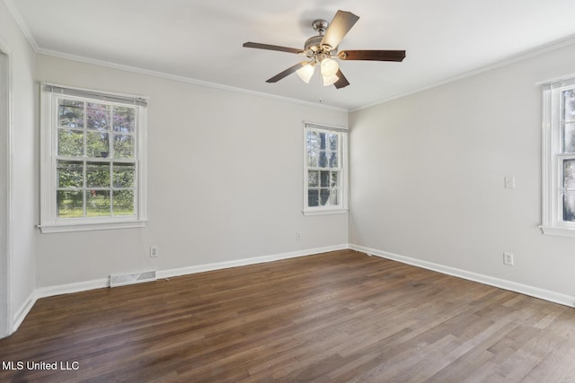 5360 Wayneland Dr, Jackson, MS 39211 - empty room featuring crown molding, wood finished floors, visible vents, and baseboards