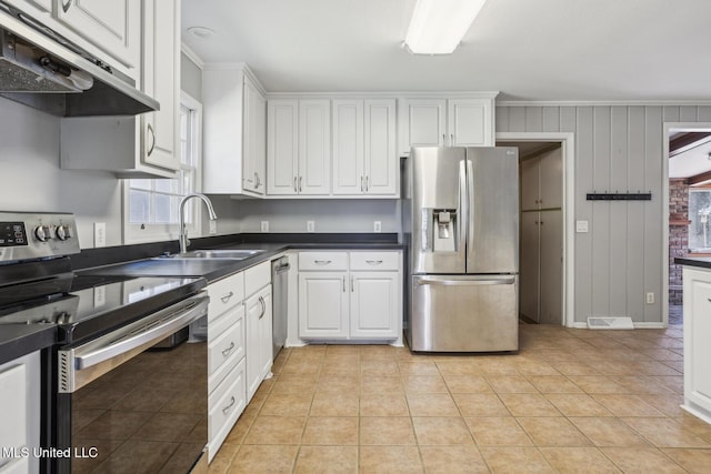 5360 Wayneland Dr, Jackson, MS 39211 - kitchen with visible vents, under cabinet range hood, white cabinets, stainless steel appliances, and a sink
