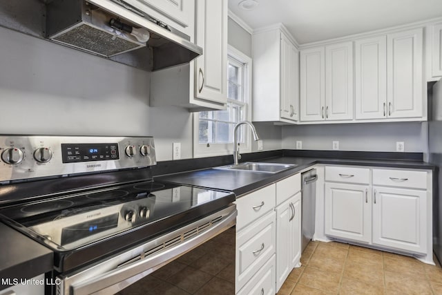 5360 Wayneland Dr, Jackson, MS 39211 - kitchen with dark countertops, under cabinet range hood, appliances with stainless steel finishes, white cabinetry, and a sink
