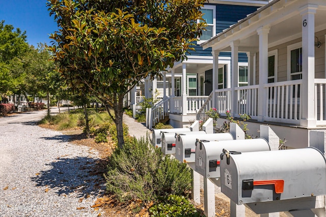 view of property exterior featuring a porch