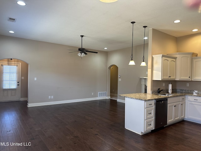 kitchen featuring visible vents, arched walkways, a ceiling fan, dishwasher, and dark wood-style flooring