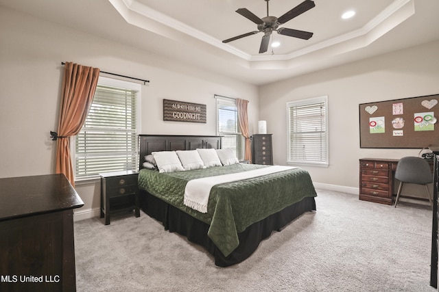 13111 Hawthorn Dr, Biloxi, MS 39532 - carpeted bedroom with a tray ceiling, ornamental molding, baseboards, recessed lighting, and a ceiling fan