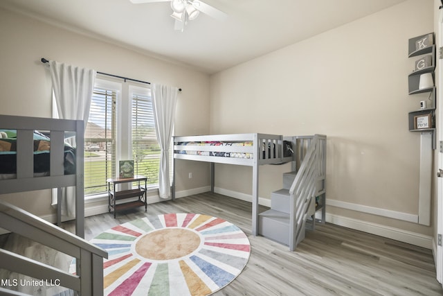 13111 Hawthorn Dr, Biloxi, MS 39532 - bedroom featuring wood finished floors and baseboards