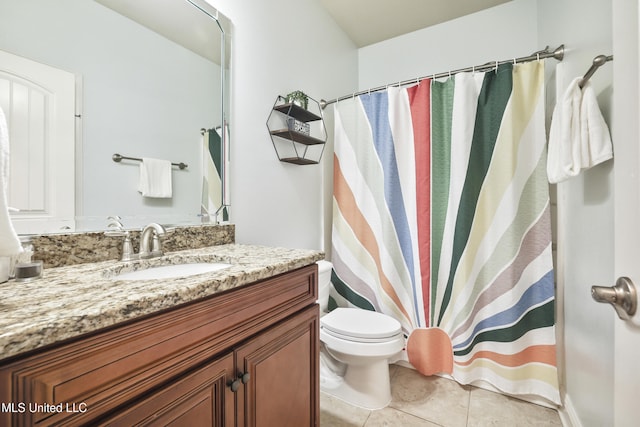 13111 Hawthorn Dr, Biloxi, MS 39532 - full bathroom featuring vanity, toilet, tile patterned flooring, and a shower with shower curtain