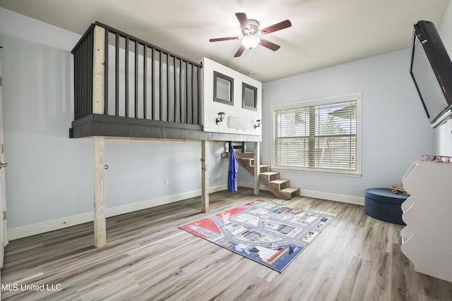 13111 Hawthorn Dr, Biloxi, MS 39532 - bedroom with wood finished floors, baseboards, and a ceiling fan