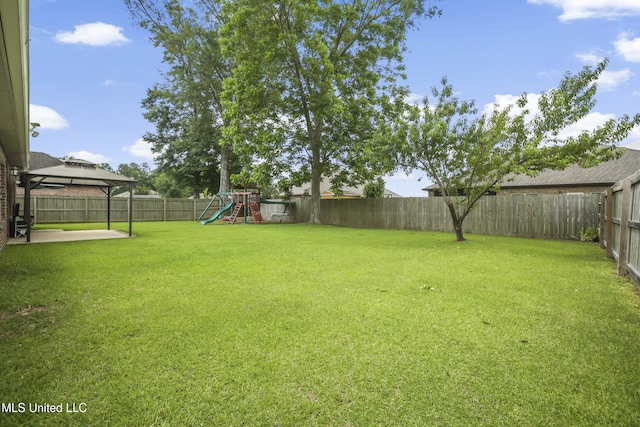 13111 Hawthorn Dr, Biloxi, MS 39532 - view of yard featuring a playground, a patio, and a gazebo