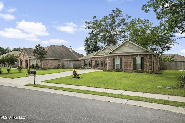 13111 Hawthorn Dr, Biloxi, MS 39532 - view of front facade featuring brick siding and concrete driveway