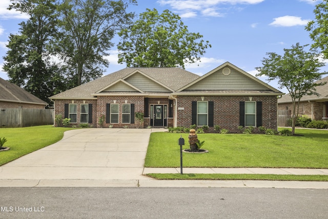 13111 Hawthorn Dr, Biloxi, MS 39532 - craftsman-style house featuring brick siding, concrete driveway, and a shingled roof