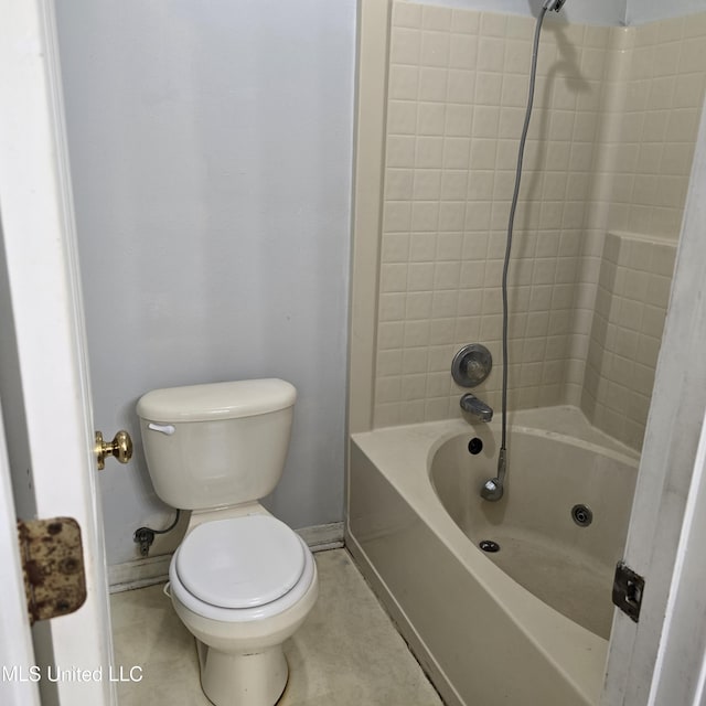 bathroom featuring  shower combination and toilet