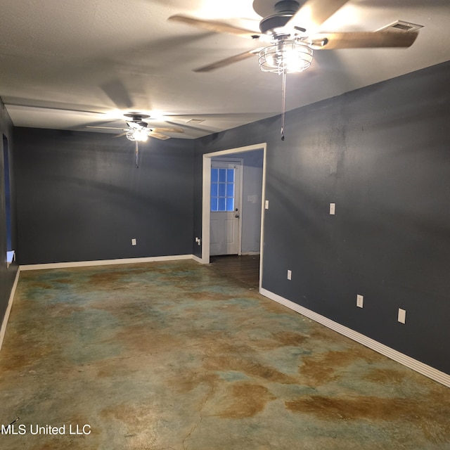 spare room featuring ceiling fan