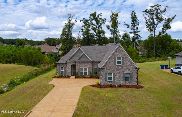 view of front of property with a front lawn