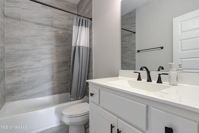 full bathroom featuring vanity, toilet, and shower / bathtub combination with curtain