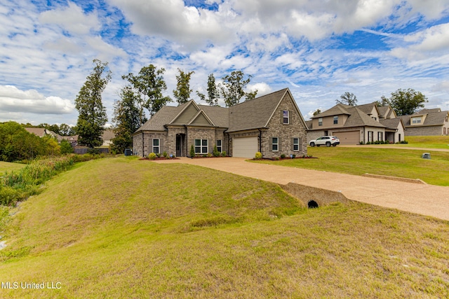 view of front facade with a front lawn and a garage