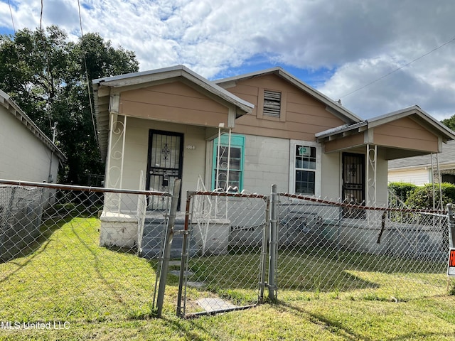 view of front of home with a front lawn