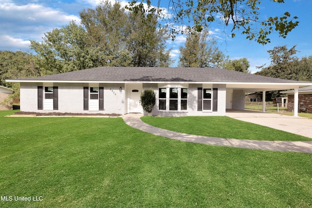 single story home with a front lawn and a carport