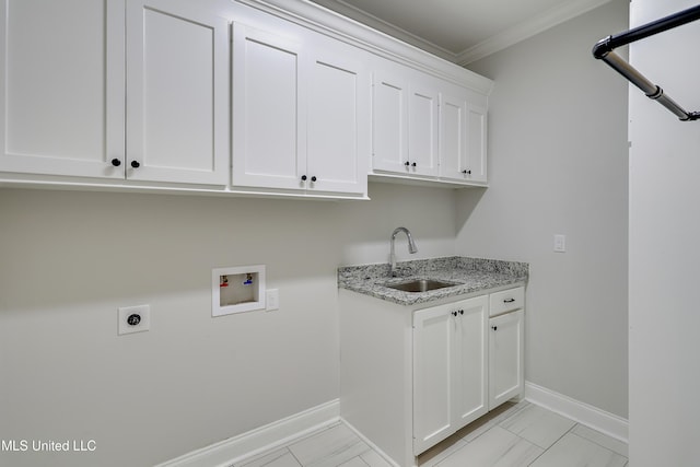 laundry area with sink, cabinets, ornamental molding, hookup for a washing machine, and hookup for an electric dryer