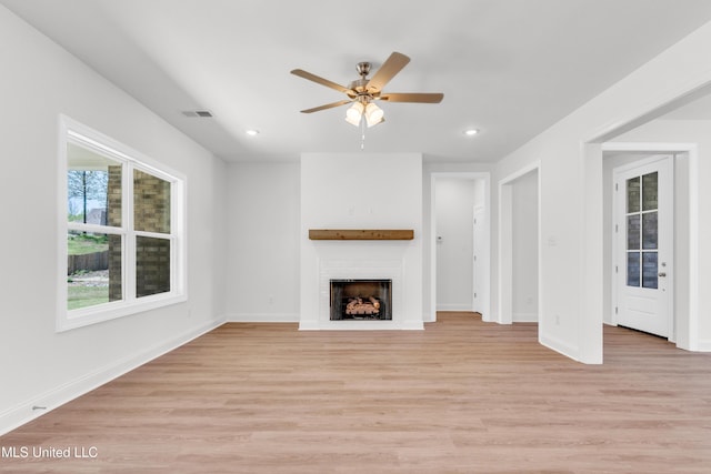 unfurnished dining area featuring an inviting chandelier, dark wood-style flooring, and baseboards