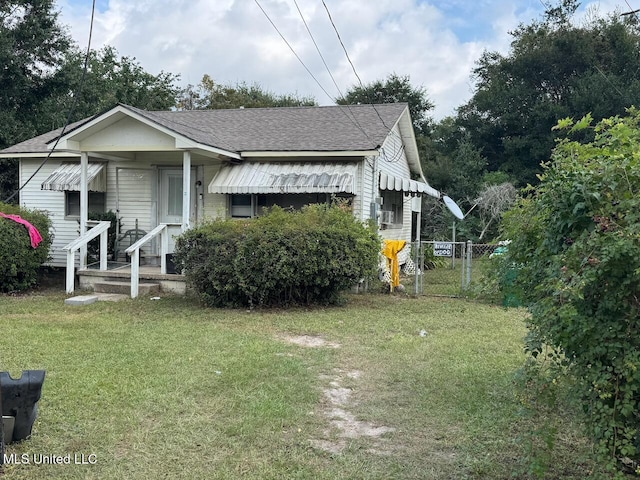 view of property exterior with a yard