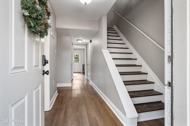 foyer with dark hardwood / wood-style flooring