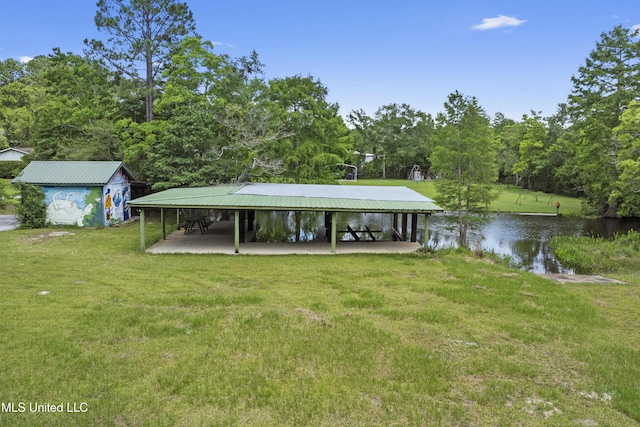 8113 Barron Rd, Moss Point, MS 39562 - dock area featuring a water view and a lawn