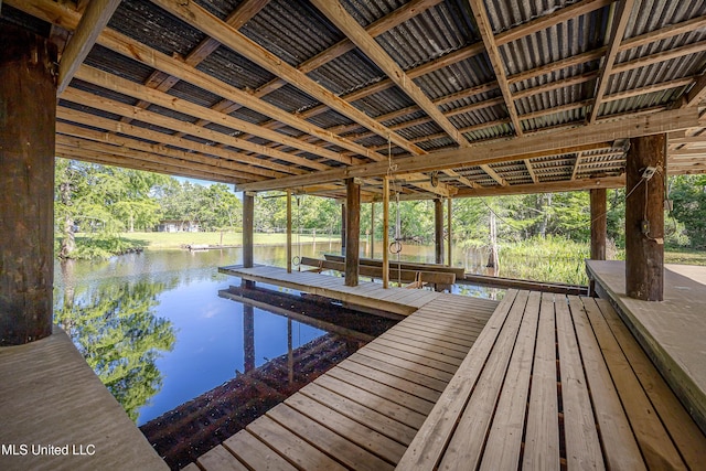 8113 Barron Rd, Moss Point, MS 39562 - dock area featuring a water view, view of scattered trees, and boat lift