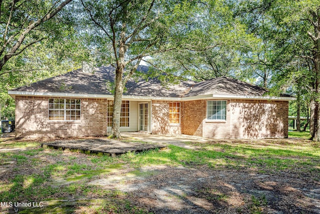 8113 Barron Rd, Moss Point, MS 39562 - ranch-style home with brick siding and a chimney