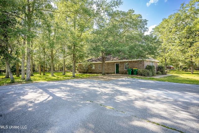8113 Barron Rd, Moss Point, MS 39562 - view of front of property with a front yard and brick siding
