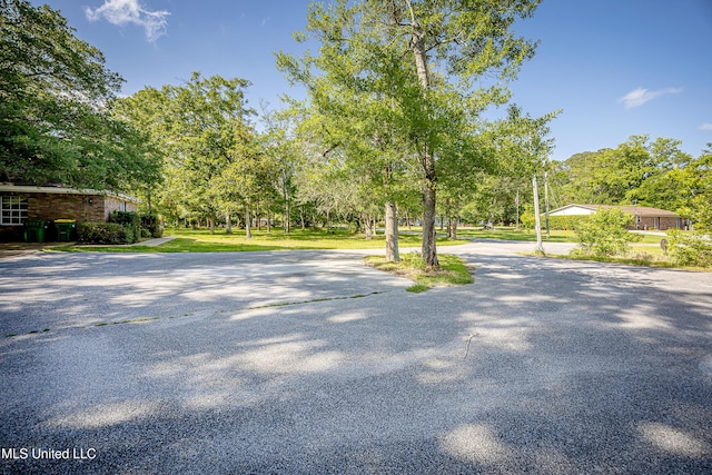 8113 Barron Rd, Moss Point, MS 39562 - view of street featuring view of wooded area