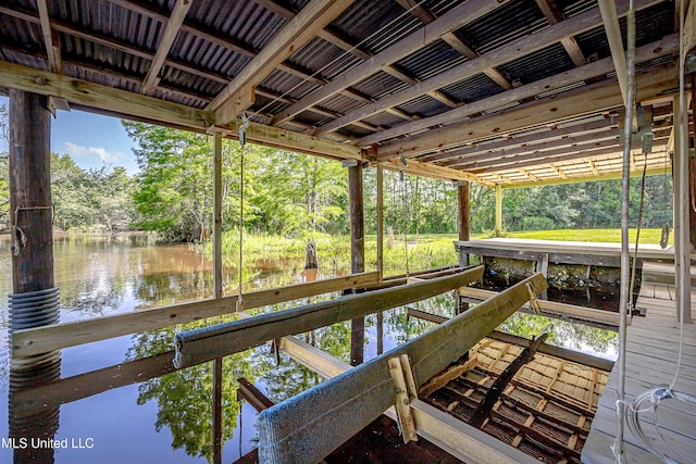 8113 Barron Rd, Moss Point, MS 39562 - dock featuring a water view, view of wooded area, and boat lift