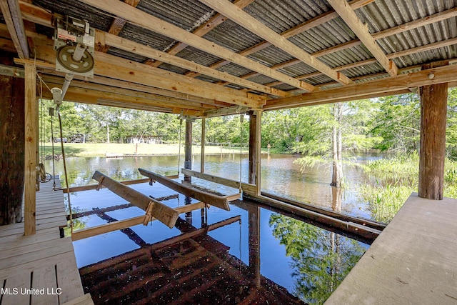 8113 Barron Rd, Moss Point, MS 39562 - dock with a water view, view of wooded area, and boat lift