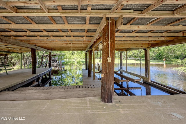 8113 Barron Rd, Moss Point, MS 39562 - dock featuring boat lift and a water view