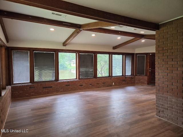 329 Arapaho Ln, Madison, MS 39110 - spare room with brick wall, beamed ceiling, wood finished floors, and recessed lighting